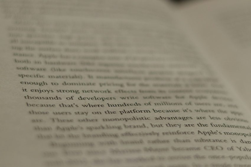 a close up of an open book with text
